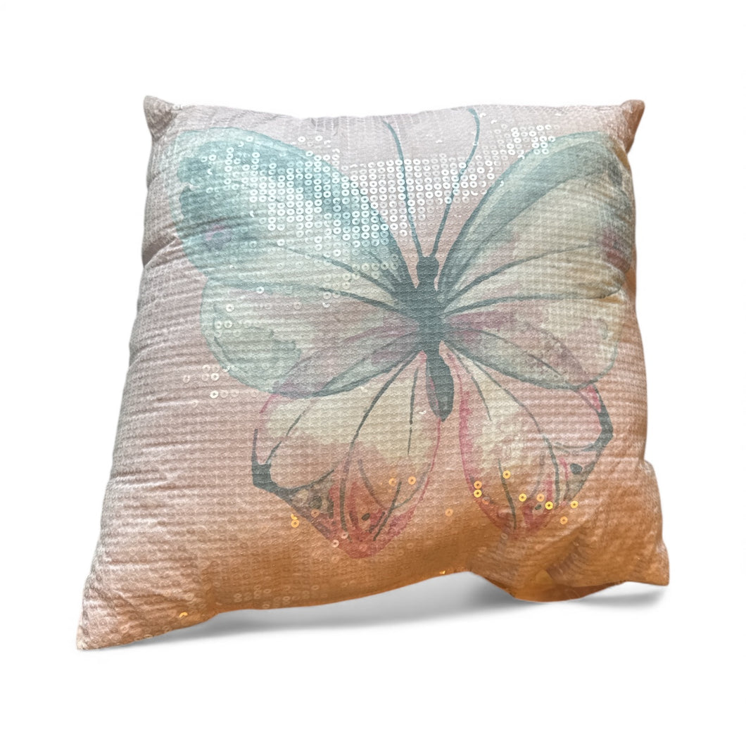 Used Fair- FREE- butterfly sequin throw pillow, rip on side that can be easily sewn . Pet free & smoke free home. 14 x 14
