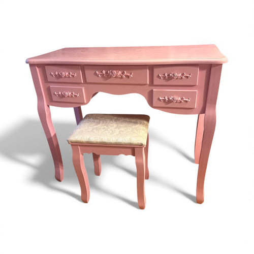 Used Good- pink desk/vanity. Minor wear on top, 15”(w) x 35”(L) x 30”h)